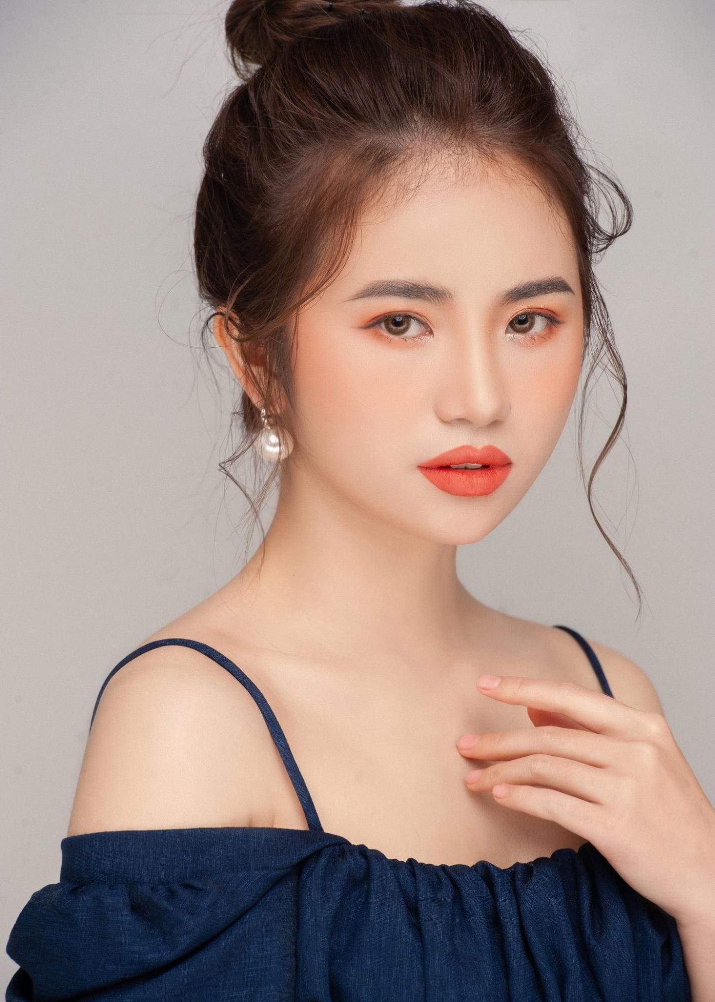 Kiểu môi tròn trặn chúm chím